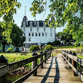 Usa, Connecticut, East Haddam, New England, Pedestrian Wooden Bridge Over Connecticut River, Green Grass, Goodspeed Opera House. by Alejandra Uribe Posada