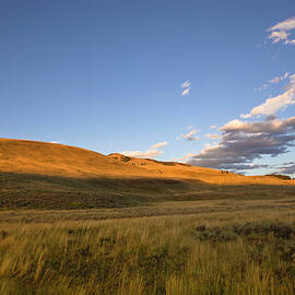 Vast And Empty Landscape At Sunset by Kubrak78