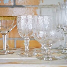 Vintage Cocktail Glasses On Shelf by Greg Rannells