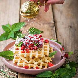 Waffles With Wild Strawberries, Red Currants And Icing Sugar by Dorota Indycka