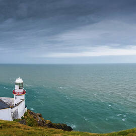 Wicklow Lighthouse at Wicklow, Ireland by Miroslav Liska