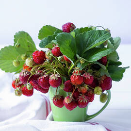 Wild Strawberries In A Green Cup by Savisionel