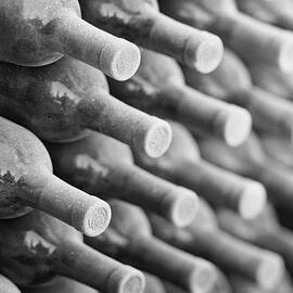 Wine Bottles In Cellar B&w by Terry Vine