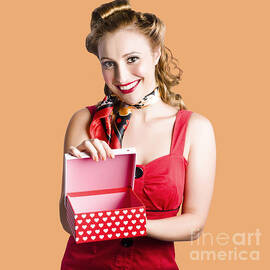 Woman holding gift box by Jorgo Photography