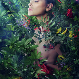 Woman Resting Amongst Many Wild Flowers by Paper Boat Creative