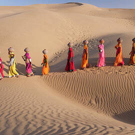 Women Fetching Water From The Sparse by Mint Images - Art Wolfe