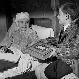 Young Boy Visiting Sick Friend by George Marks