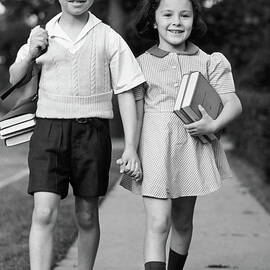 Young Girl & Boy Walking To School W by George Marks