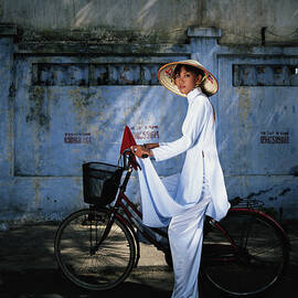 Young Woman Astride Bicycle, Portrait by Buena Vista Images