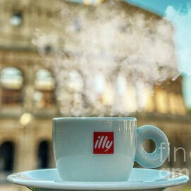 A cup of coffee in front of Colosseum in Rome by Stefano Senise