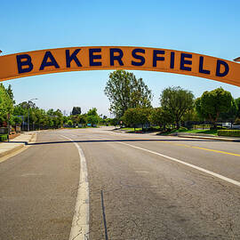 Bakersfield welcome sign, a wide arched street sign by Miroslav Liska