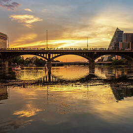 Bat watchers crowd on Congress Avenue bridge waiting for bats to by Steven Heap