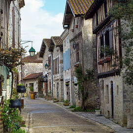 Empty streets in tranquil Pujols, Lot-et-Garonne, France. by Seeables Visual Arts