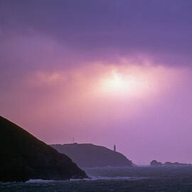 Evening sun through storm clouds by Seeables Visual Arts