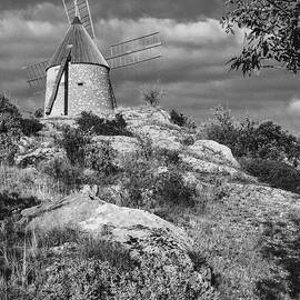 Restored windmill on the hill above St Chinian by Seeables Visual Arts