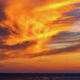 Sunset over Mazatlan by Tommy Farnsworth