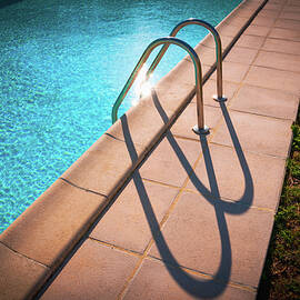 Swimming pool ladder shadows by Seeables Visual Arts