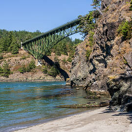 Turbulent water of Deception Pass under historic cantilevered br by Steven Heap