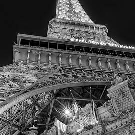 Underneath The Eiffel Tower BW by Susan Candelario