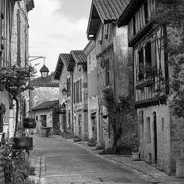 Empty streets in tranquil Pujols, Lot-et-Garonne, France. by Seeables Visual Arts