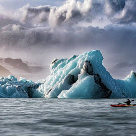 Iceberg Sunset with Kayak by DEE POTTER
