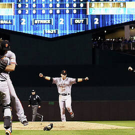 Madison Bumgarner and Buster Posey by Jamie Squire