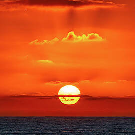 Sunset over the Pacific Ocean by Tommy Farnsworth