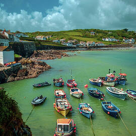 Boats in the harbour of traditional Coverack village in rural Co by Seeables Visual Arts