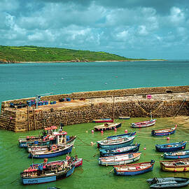 Boats in the harbour of traditional Coverack village in rural Co by Seeables Visual Arts