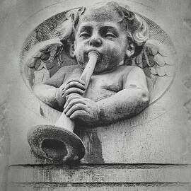 A Winged Cherub in Amsterdam by Mary Lee Dereske