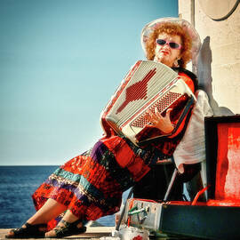 Accordion player by Tatiana Travelways