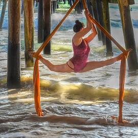 Aerial Silk Dancer Under the Pier by Rebecca Herranen