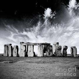 Ancient Stonehenge Stone Circle under Dramatic Sky - Black and White by Dmr Filho