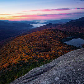 Autumn Sunrise, Cannon Cliffs.  by Jeff Sinon