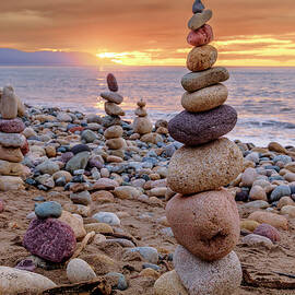 Beach Cairns in Mexico by Kevin Schwalbe
