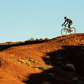 Bicyclist in Monument Valley