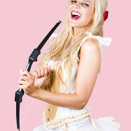 Blond beauty cupid firing love arrow by Jorgo Photography