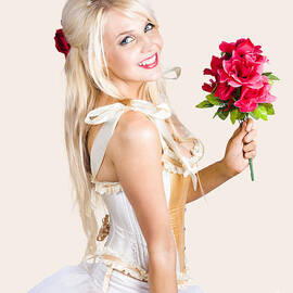 Blond dancing woman with red flowers by Jorgo Photography