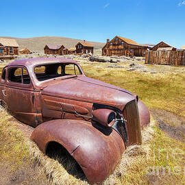 Bodie ghost town,1937 Chevrolet coupe, California by Neale And Judith Clark
