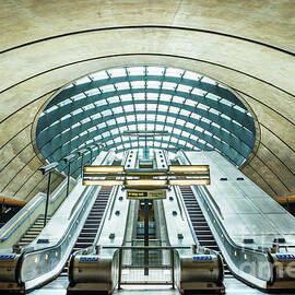 Canary wharf underground station escalators, London, England by Neale And Judith Clark