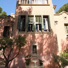 Charming Pink House at Park Guell by Travel Essayist