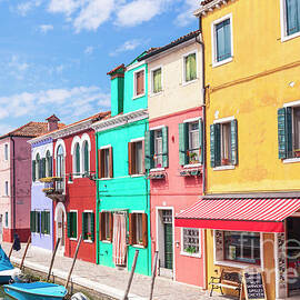 Coloured houses on the island of Burano in the Venice lagoon, Venice, Italy by Neale And Judith Clark