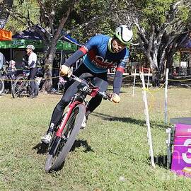Cyclist Competing in Outdoor Race 2814 by Donn Ingemie