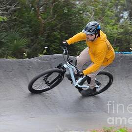 Cyclist on Banked Track 2395 by Donn Ingemie
