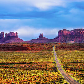 Desert road leading to Monument Valley in Navajo Nation Reservation by Miroslav Liska