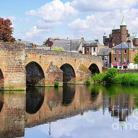 Devorgilla bridge reflected in the river Nith, Dumfries, Dumfries and Galloway, Scotland by Neale And Judith Clark