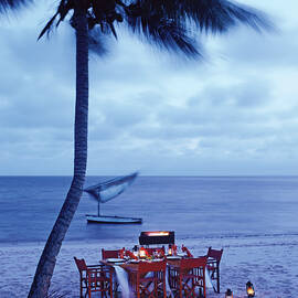 Dinner Table on the Beach in Mozambique by Tim Beddow