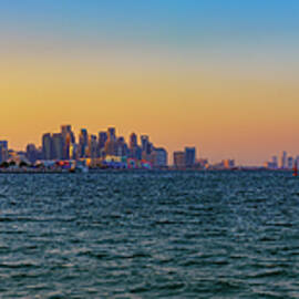 Doha Skyline Panorama at Sunset by Miroslav Liska
