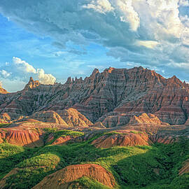 Dramatic Badlands Landscape Under Blue Sky by Dan Sproul
