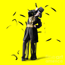 Entertainer dancing among falling feathers by Jorgo Photography